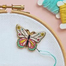 Needle minder butterfly
